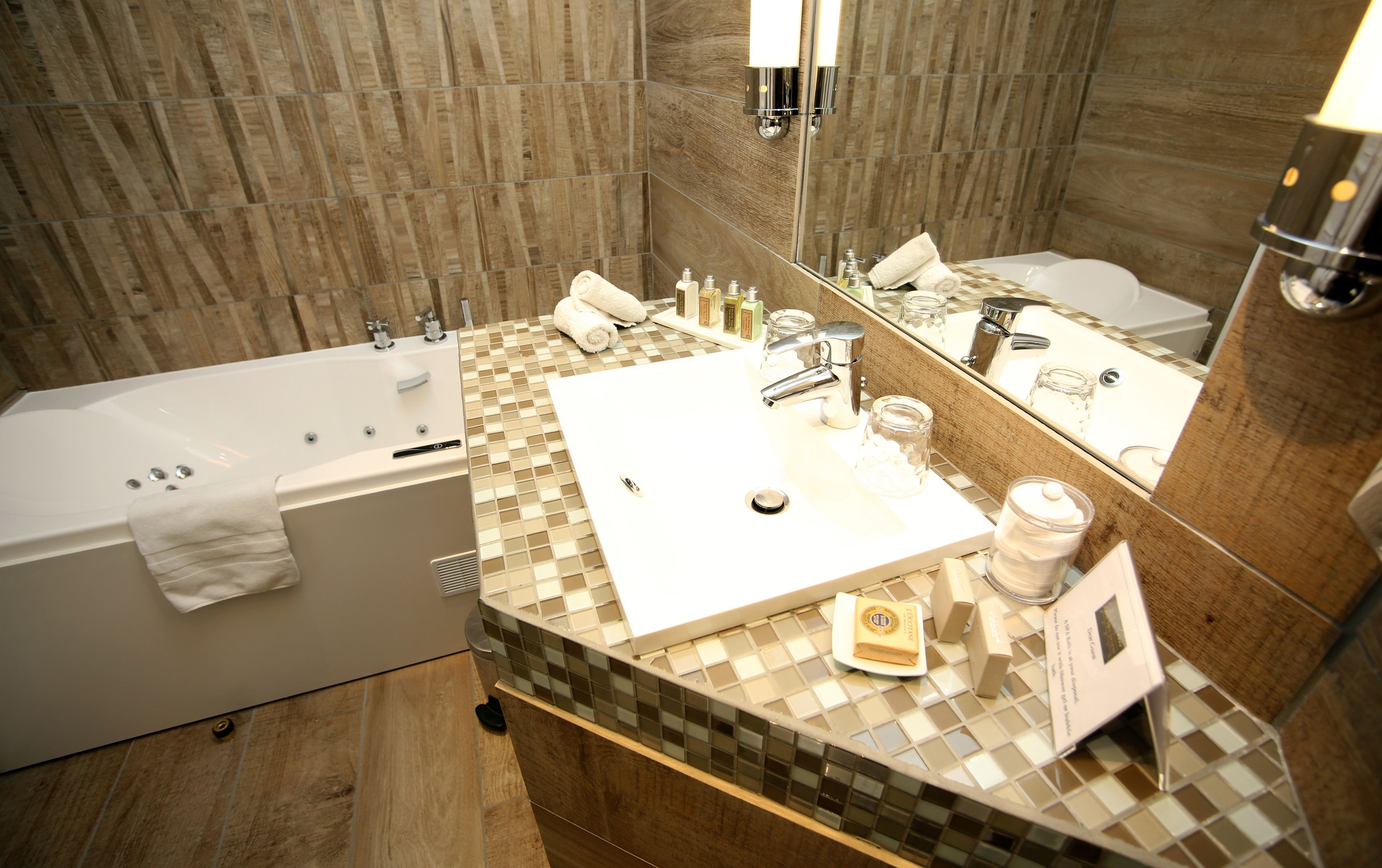 hydromassage showerhead, designer toiletries, hair dryer, bathrobes