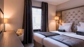 Double or Twin Room | Minibar, in-room safe, desk, blackout drapes