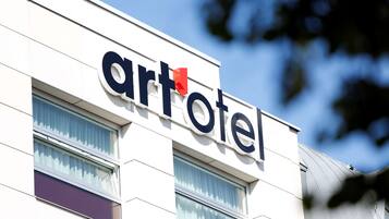 A building with the sign 'artotel' indicating it is an artotel hotel.