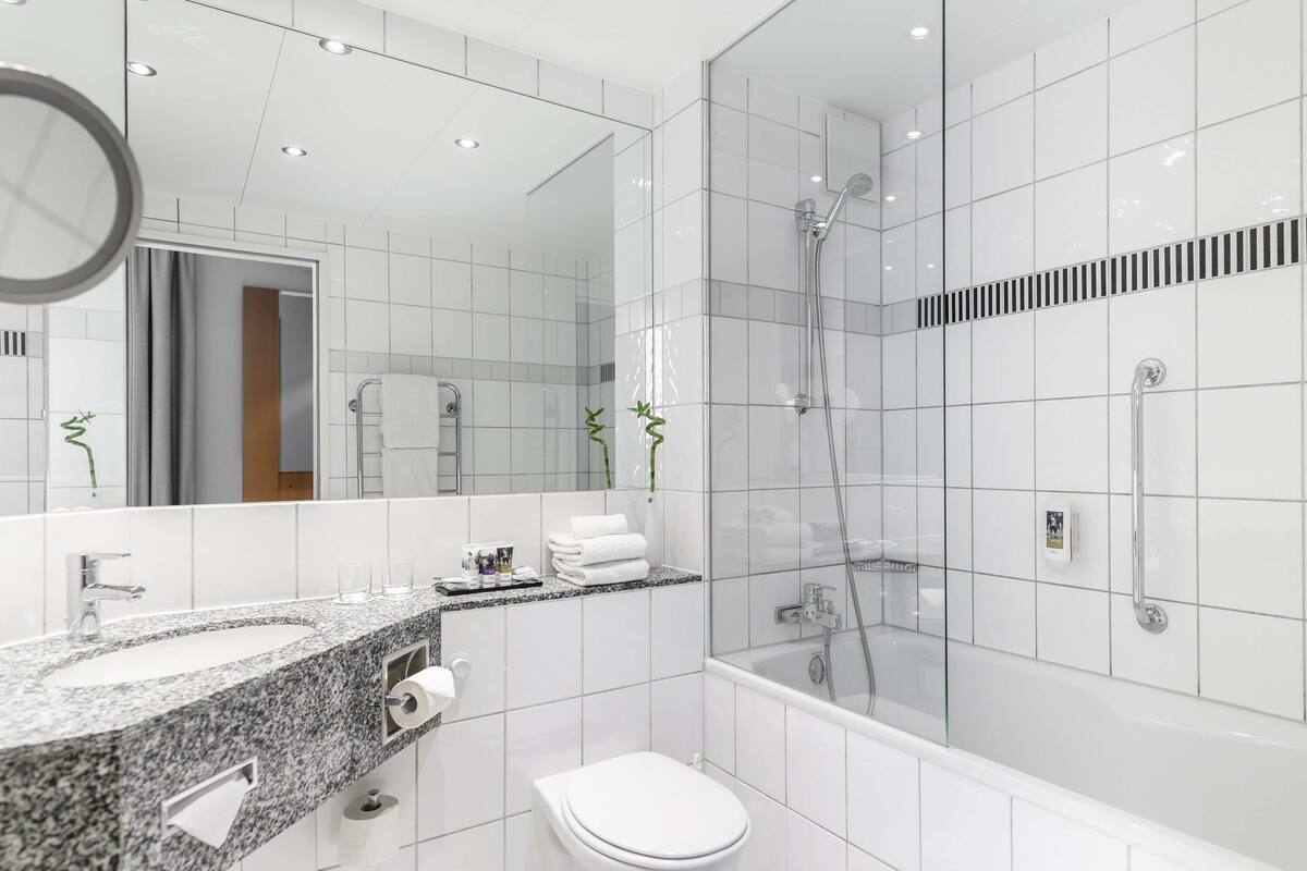 premium bedding, desk, laptop workspace, blackout curtains