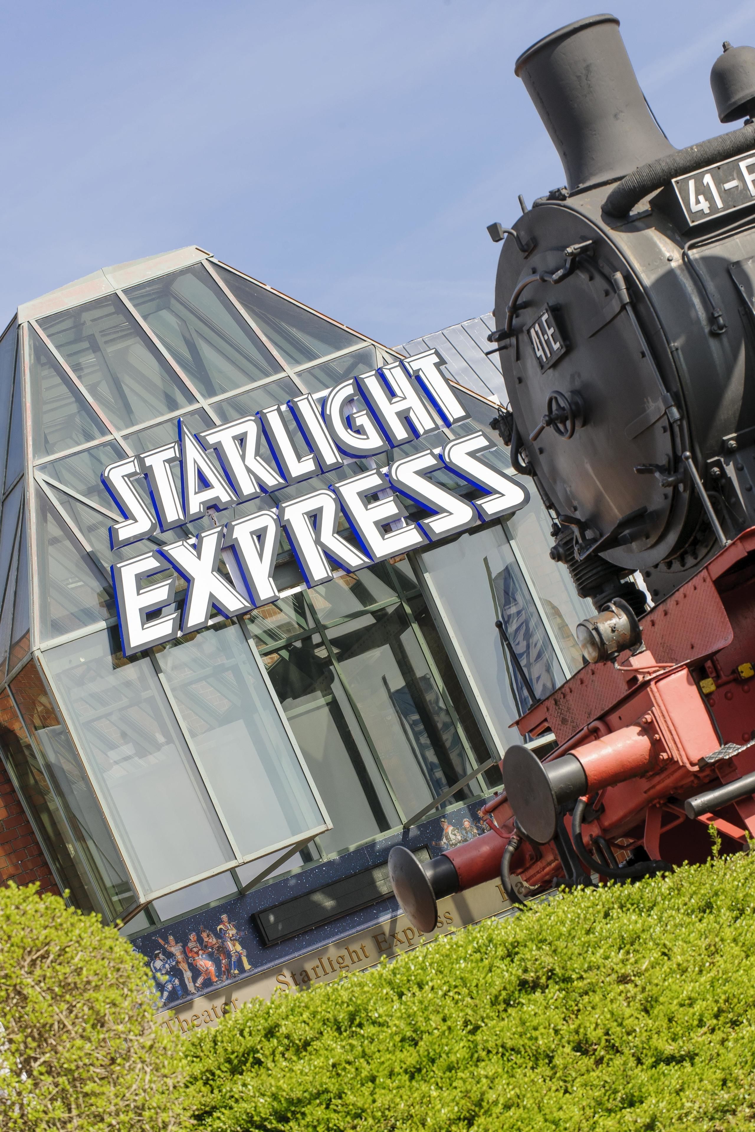 A building with a large sign reading "Starlight Express."
