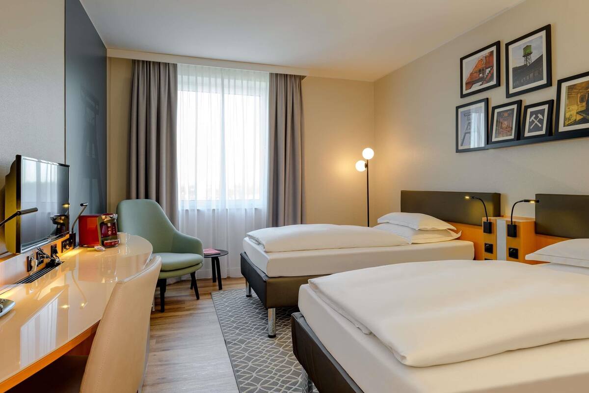 premium bedding, desk, laptop workspace, blackout curtains