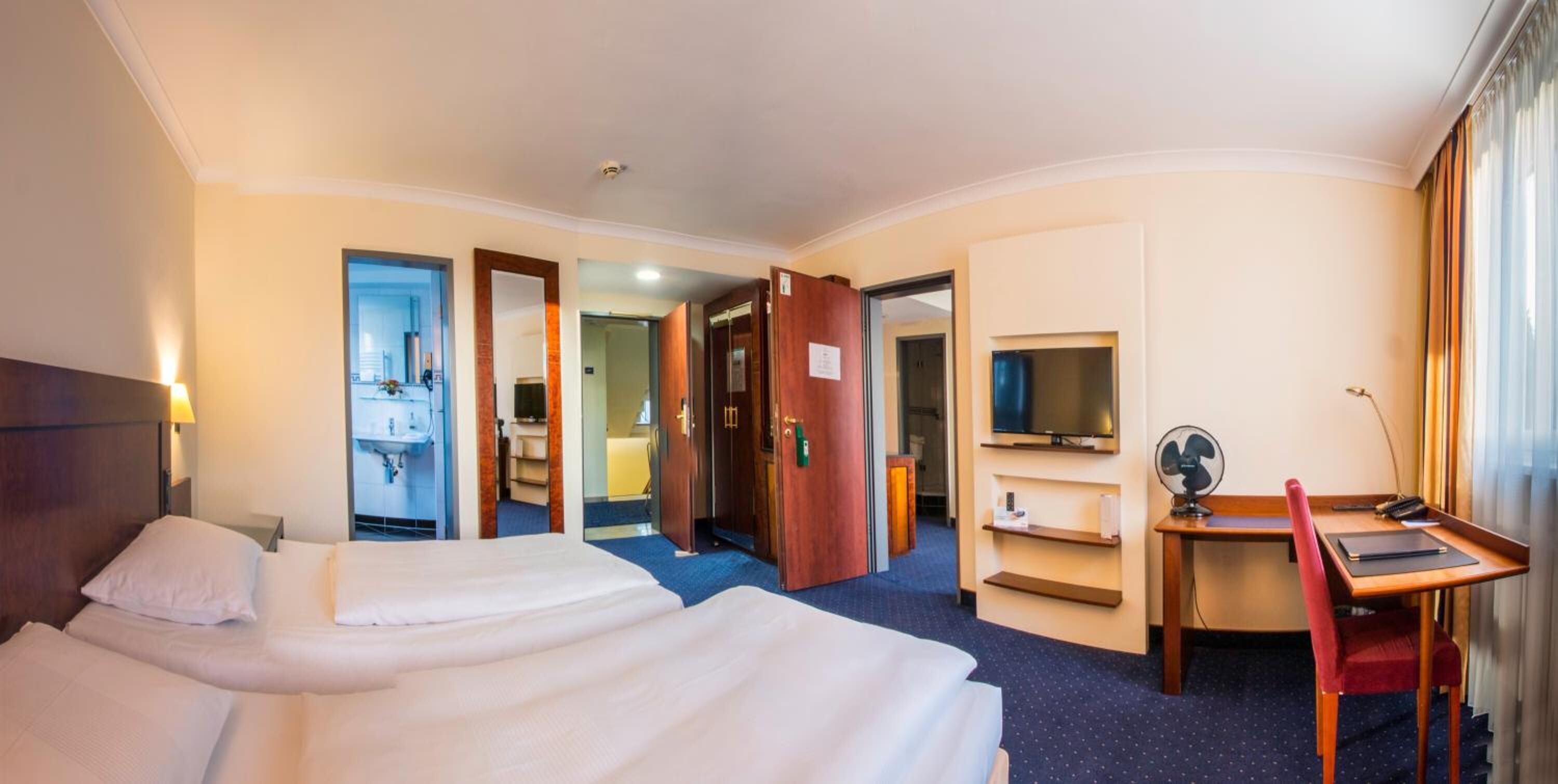 hypo-allergenic bedding, down duvets, memory-foam beds, minibar