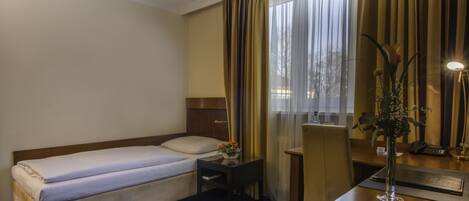 Hypo-allergenic bedding, down comforters, memory foam beds, minibar