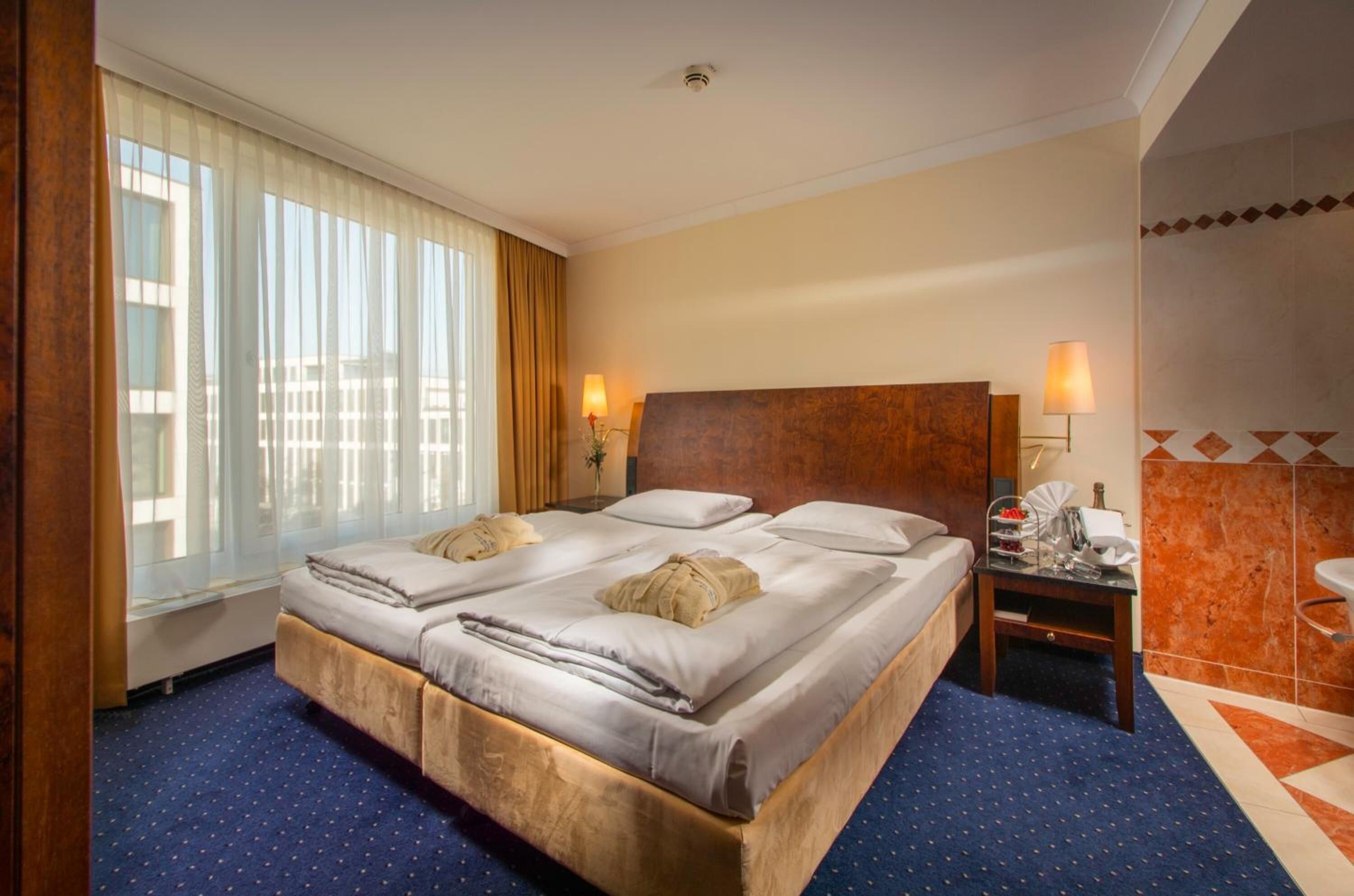 hypo-allergenic bedding, down duvets, memory-foam beds, minibar