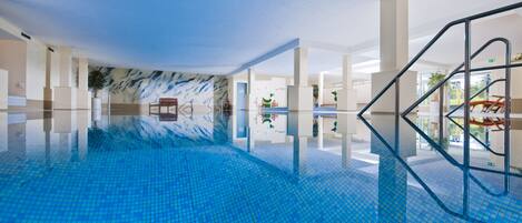 Indoor pool, open 7:00 PM to 10:00 PM, sun loungers