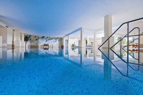 Indoor pool, open 7:00 PM to 10:00 PM, sun loungers