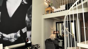 Maisonette Suite | Living area | Flat-screen TV