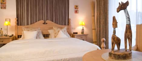 Hypo-allergenic bedding, minibar, in-room safe, individually decorated