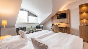 Hypoallergeen beddengoed, een kluis op de kamer, een bureau