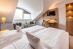 Literie hypoallergénique, coffres-forts dans les chambres, bureau