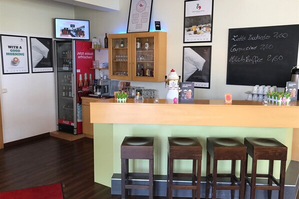 Enjoy a drink at the bar, where you can order a Latte Macchiato, Cappuccino, or Milk Coffee.