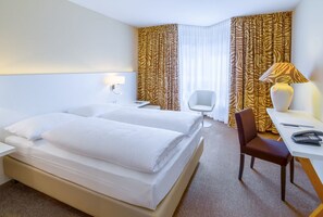 Premium bedding, pillow-top beds, minibar, in-room safe