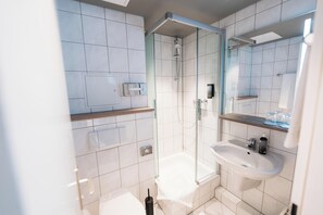 Shower, free toiletries, hair dryer, towels