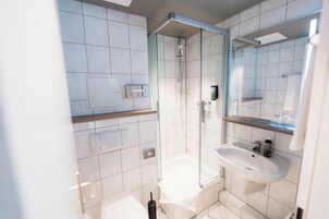 Shower, free toiletries, hair dryer, towels