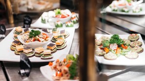 A buffet with various food items including sushi, salads, and appetizers. - City Park Hotel (Frankfurt an der Oder)