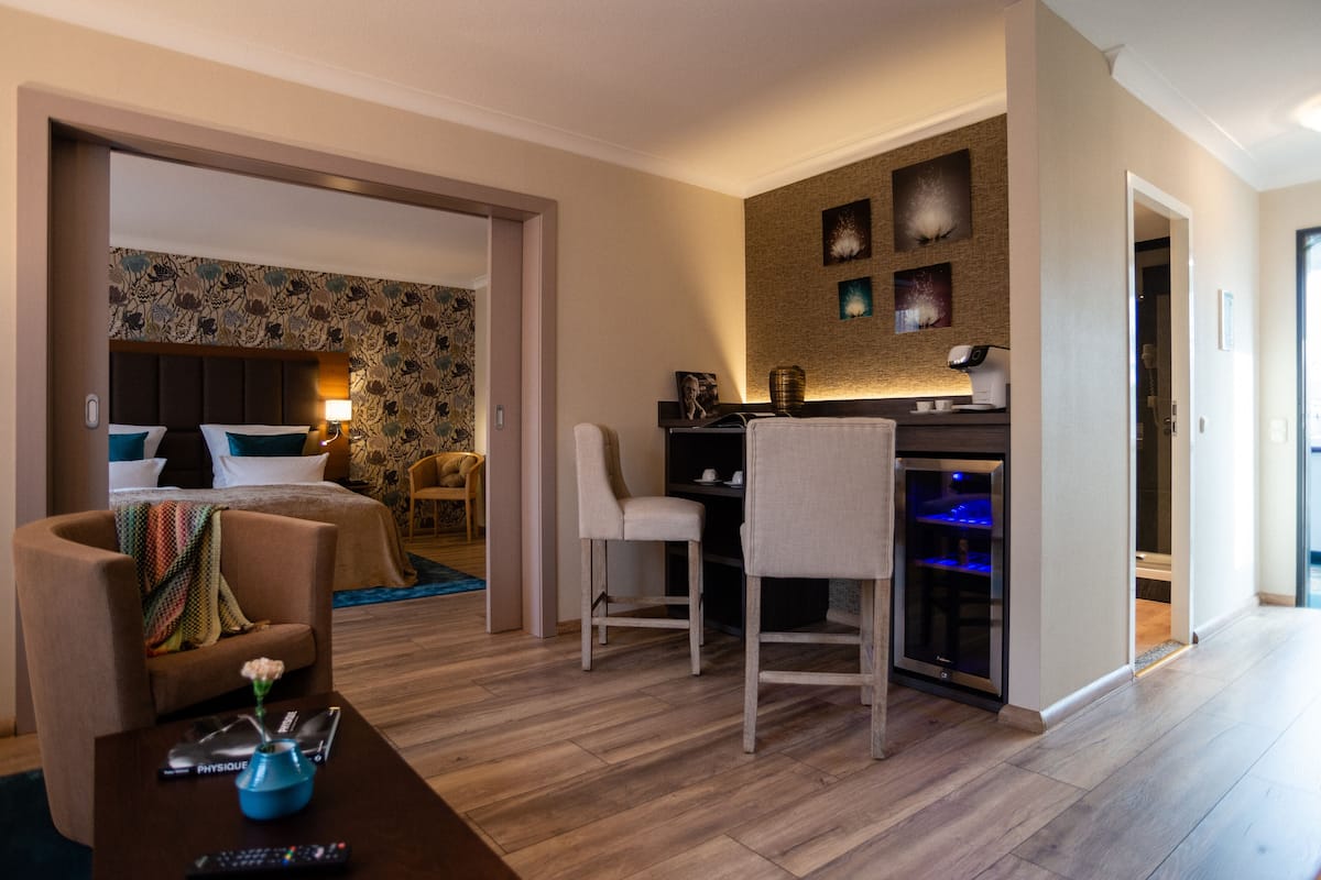 suite, 1 king bed, 2 bathrooms, garden area (incl. 3.50€ per room/night energy fee) | 1 bedroom, hypo-allergenic bedding, down duvets, in-room safe