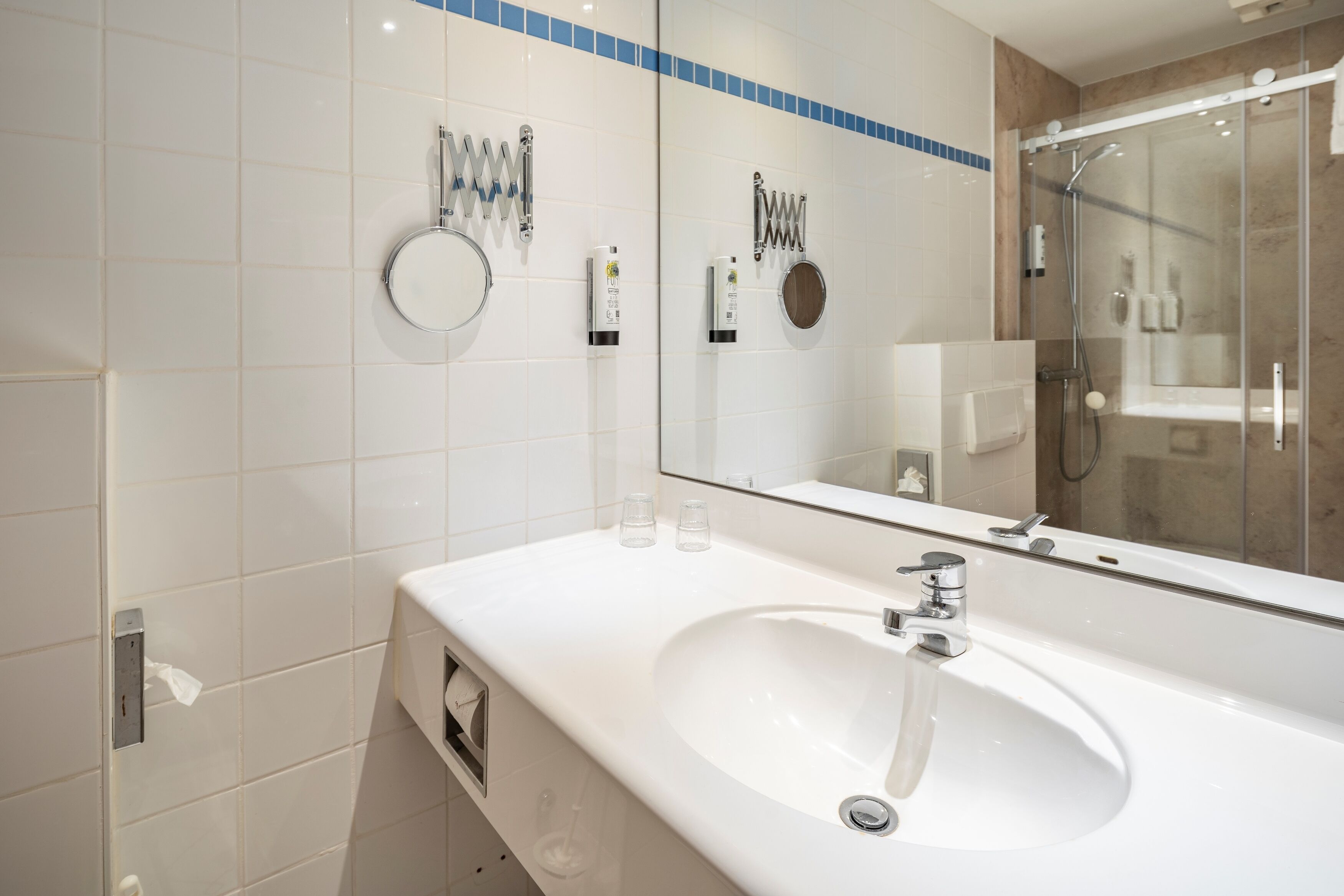 hair dryer, towels, toilet paper