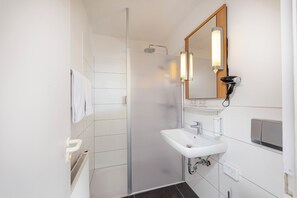 Shower, eco-friendly toiletries, hair dryer, towels