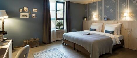 Hypo-allergenic bedding, blackout curtains, iron/ironing board