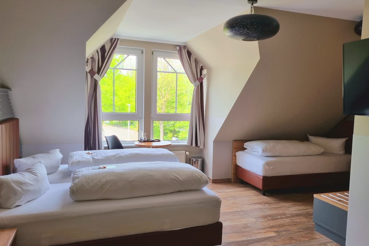 family double room | hypo-allergenic bedding, blackout curtains, iron/ironing board