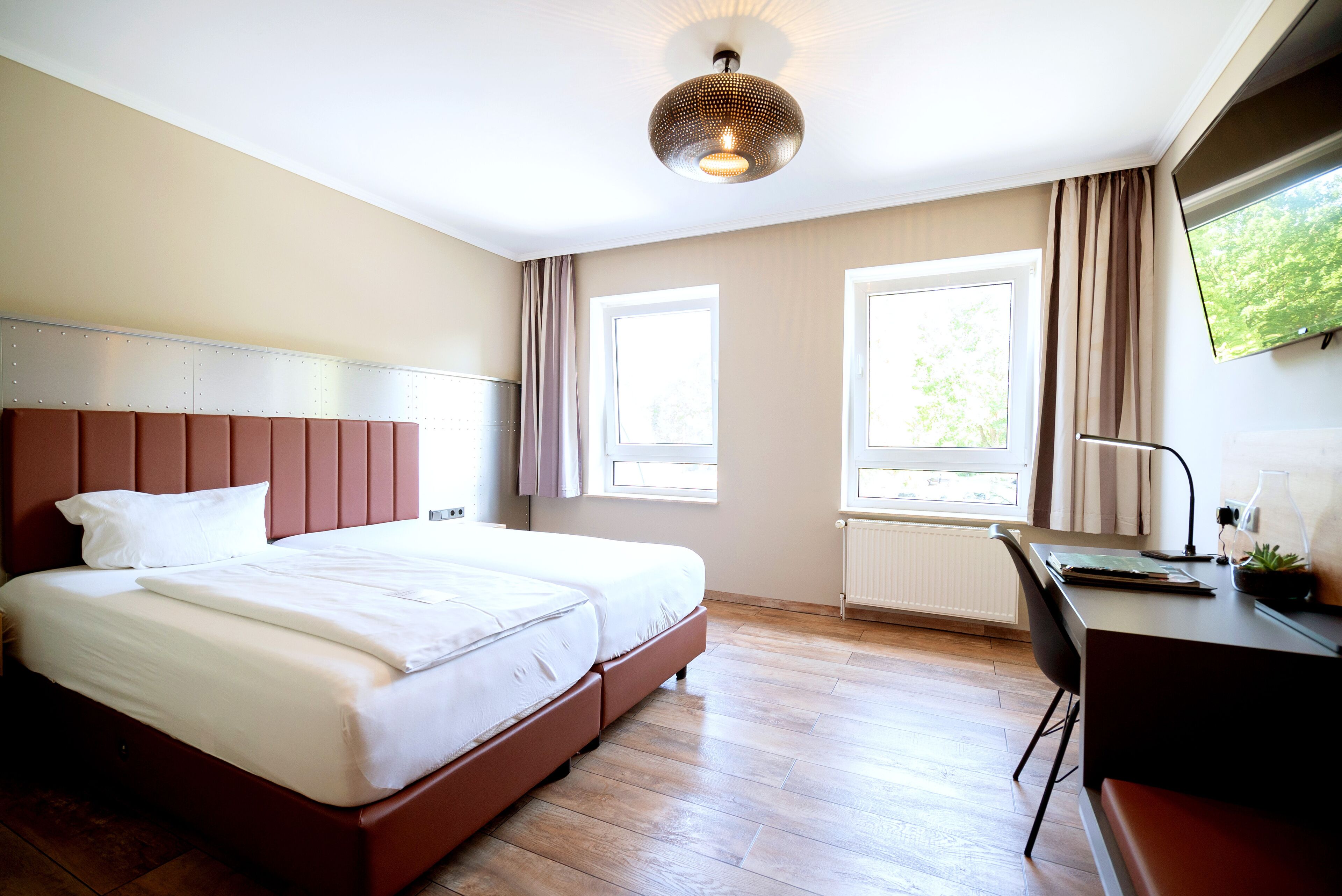 Hypo-allergenic bedding, blackout drapes, iron/ironing board, free WiFi