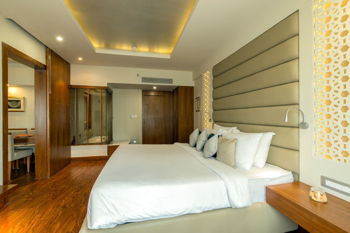Suite Junior, 1 kamar tidur, pemandangan kota | 1 kamar tidur, seprai premium, selimut bulu angsa, dan minibar