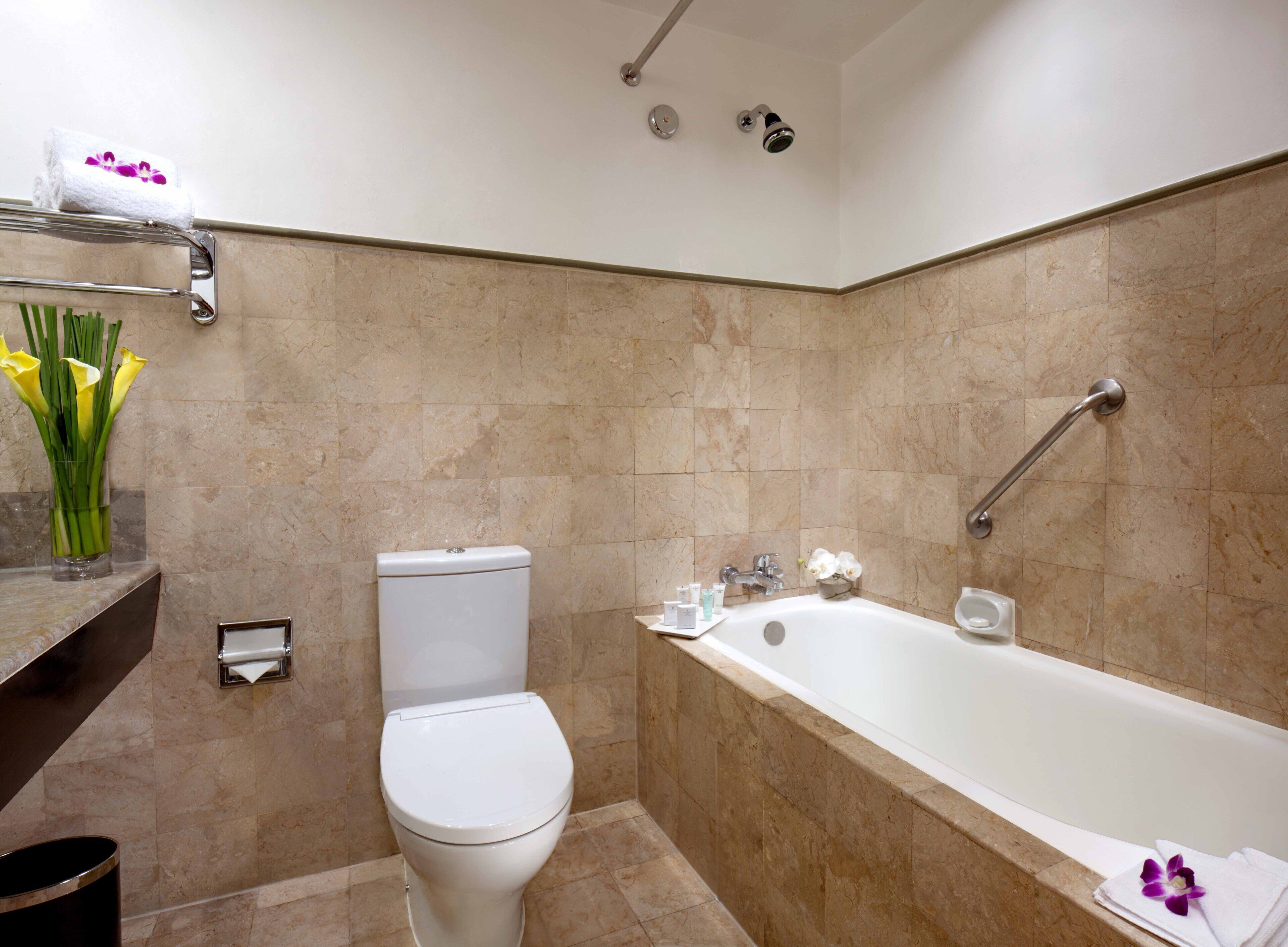 Bathroom | Combined shower/bathtub, free toiletries, hair dryer, slippers