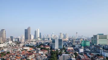 A cityscape with a mix of high-rise buildings and residential areas.