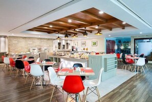 Breakfast, lunch, dinner served; international cuisine