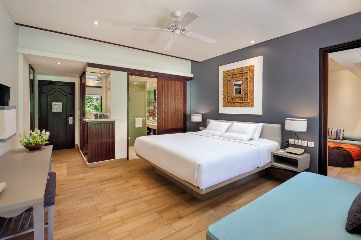 Family Room, Multiple Beds (Garden Wing Separated from the Beach by the Road) | Down duvets, in-room safe, desk, blackout curtains