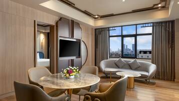 Privilege, Suite, 1 King Bed with Sofa bed | Living area | LED TV, fireplace
