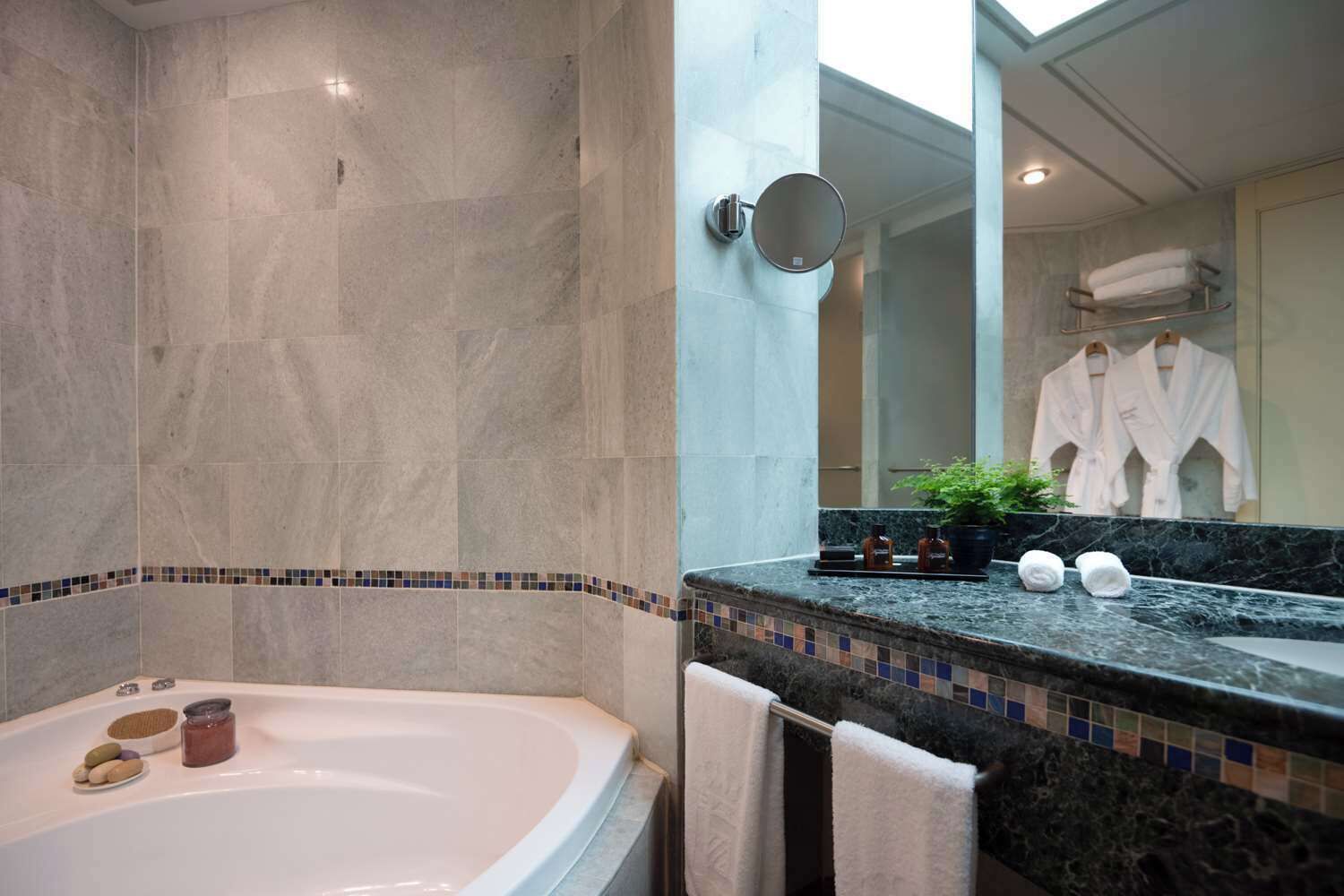 combined shower/bathtub, deep-soaking bathtub, designer toiletries