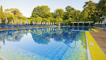 Indoor pool, seasonal outdoor pool, pool umbrellas, sun loungers