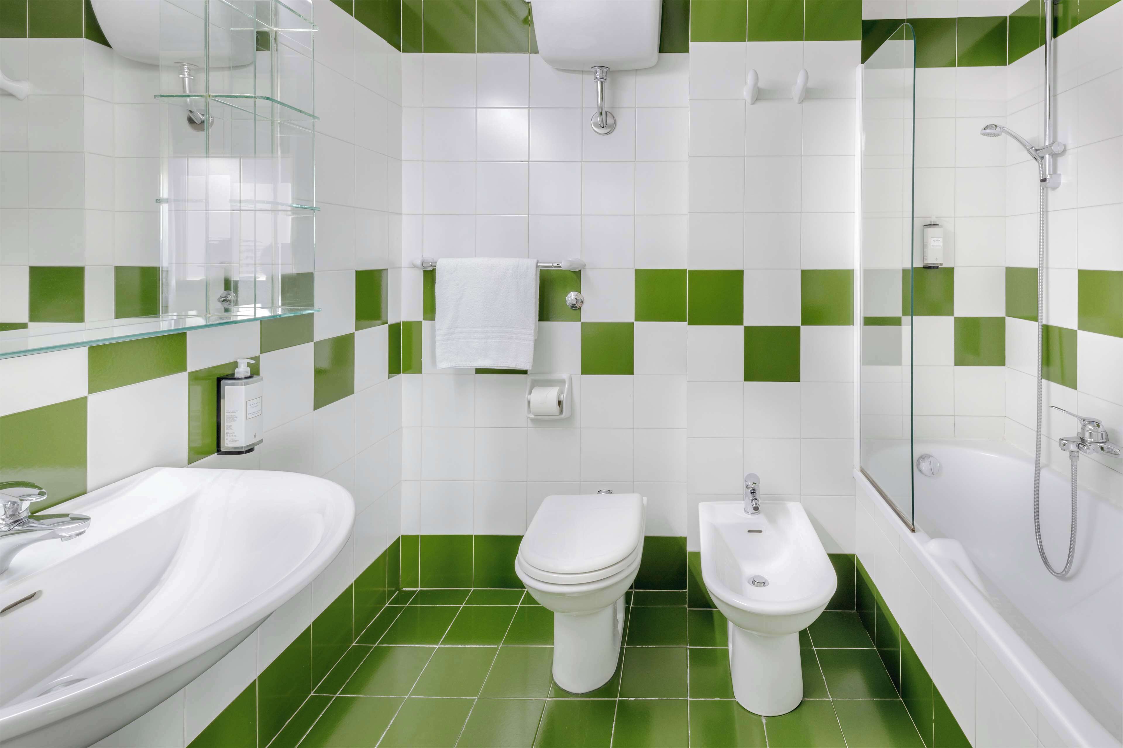 standard room, multiple beds | bathroom | shower, hair dryer, bidet, towels