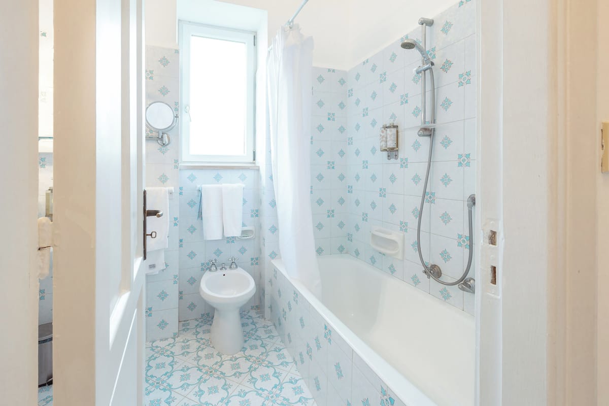 superior double room, balcony, sea view | bathroom | designer toiletries, hair dryer, slippers, bidet