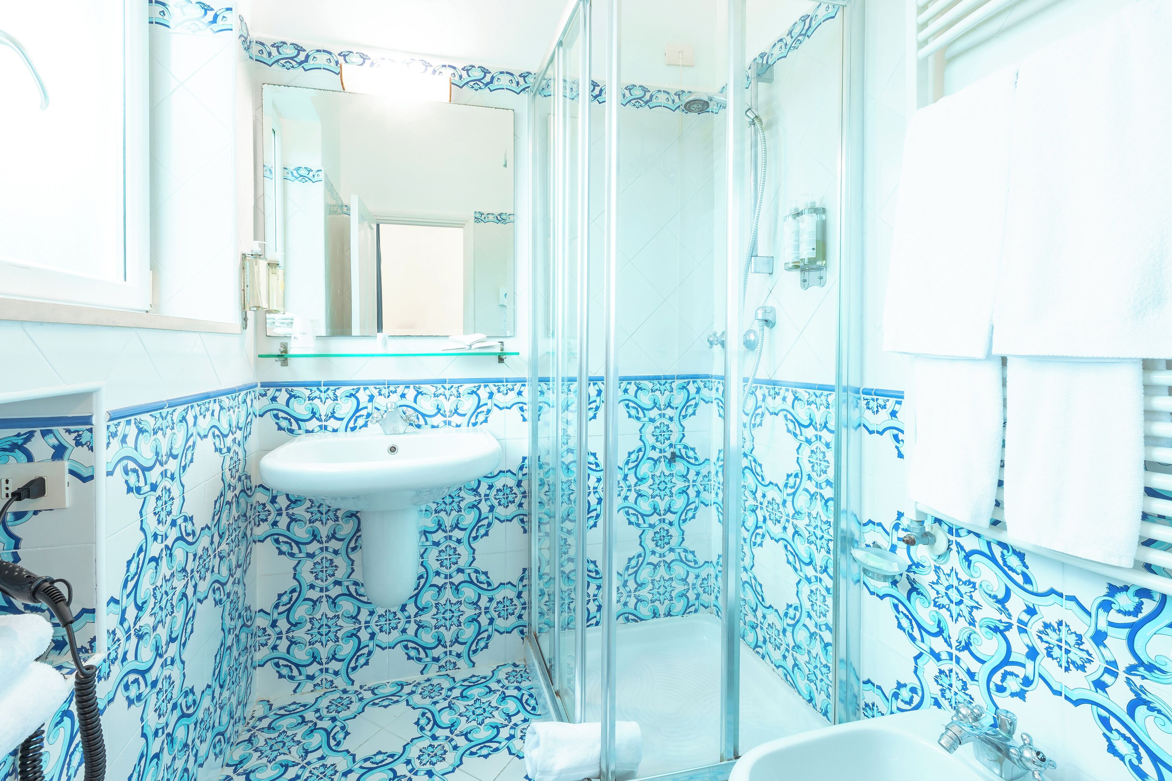 standard double room, garden view | bathroom | designer toiletries, hair dryer, slippers, bidet