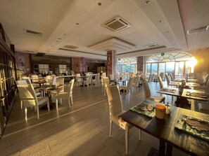 Breakfast, lunch, dinner served; Italian cuisine, al fresco dining 