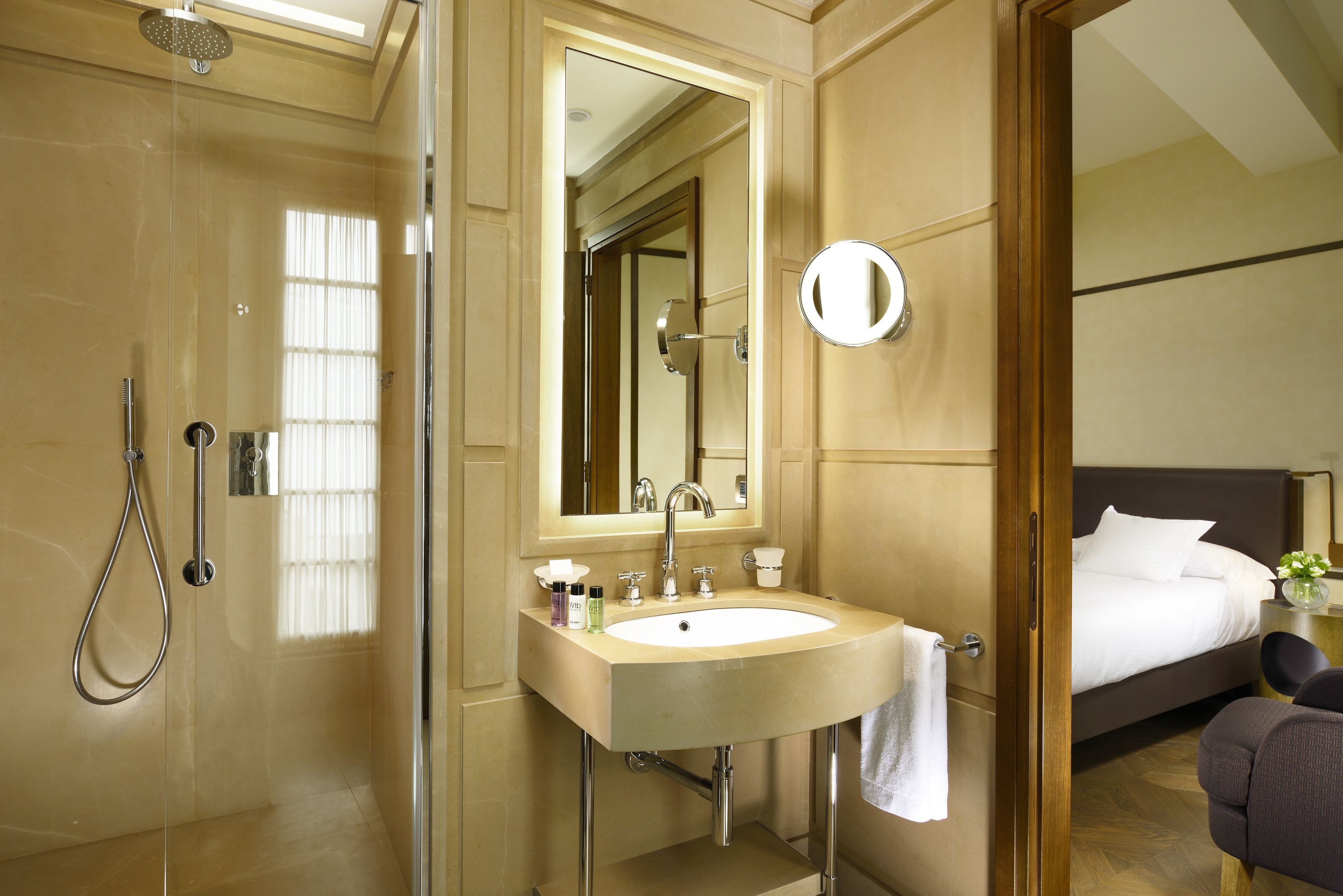 combined shower/bathtub, free toiletries, hair dryer, slippers