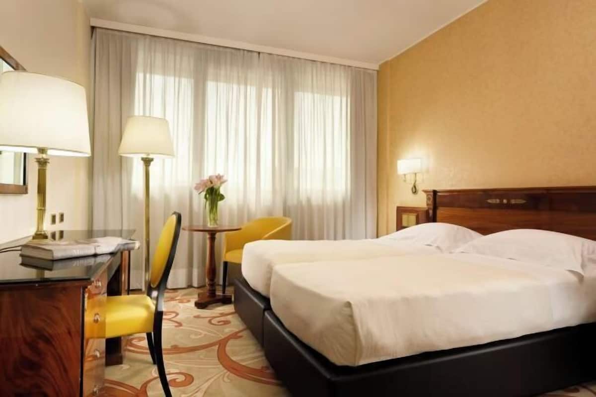 Hypo-allergenic bedding, down duvets, minibar, in-room safe