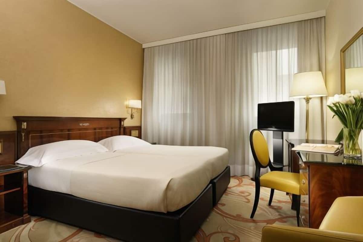 Hypo-allergenic bedding, down duvets, minibar, in-room safe