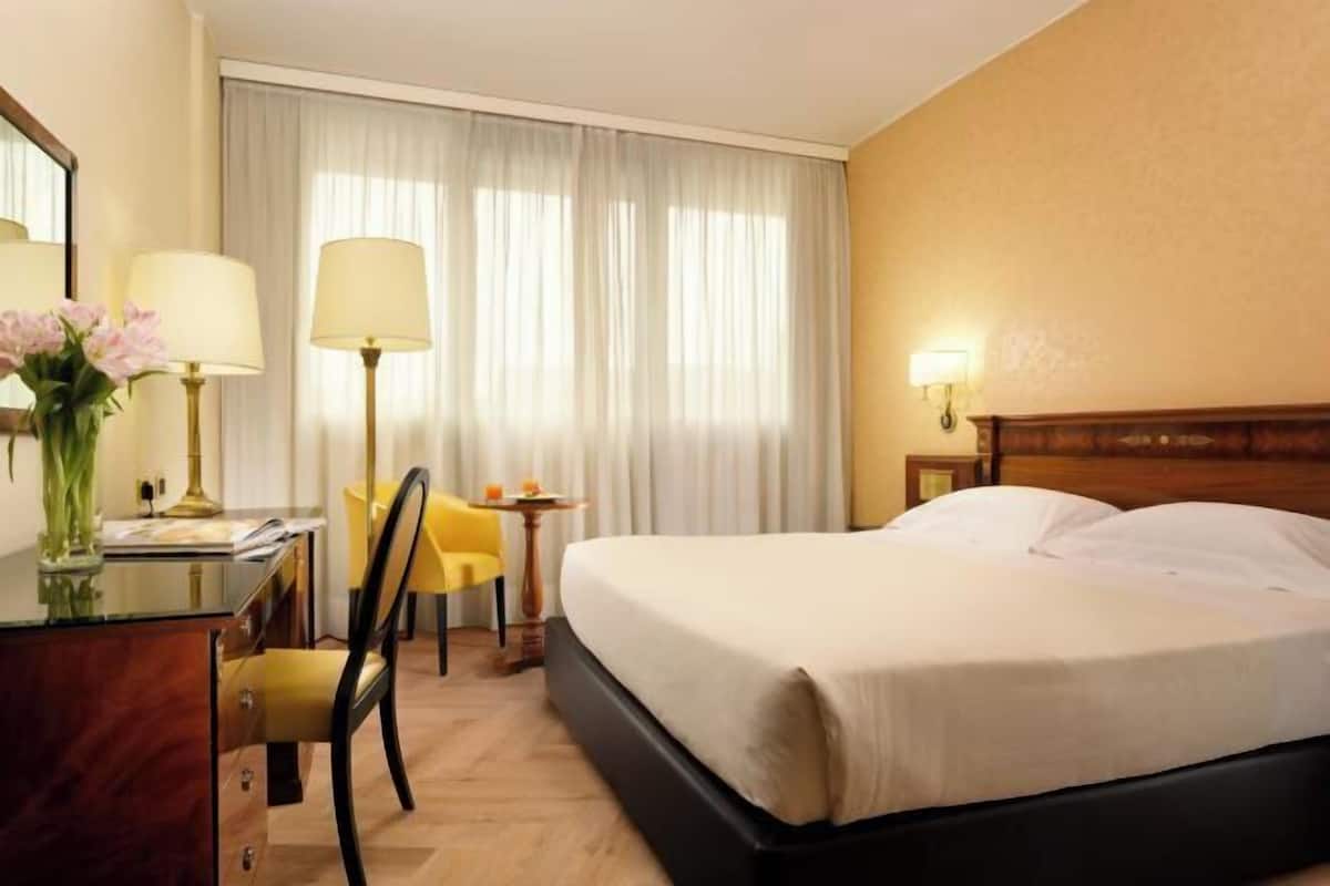 Hypo-allergenic bedding, down duvets, minibar, in-room safe