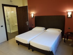 Superior Double or Twin Room | Minibar, in-room safe, individually furnished, desk