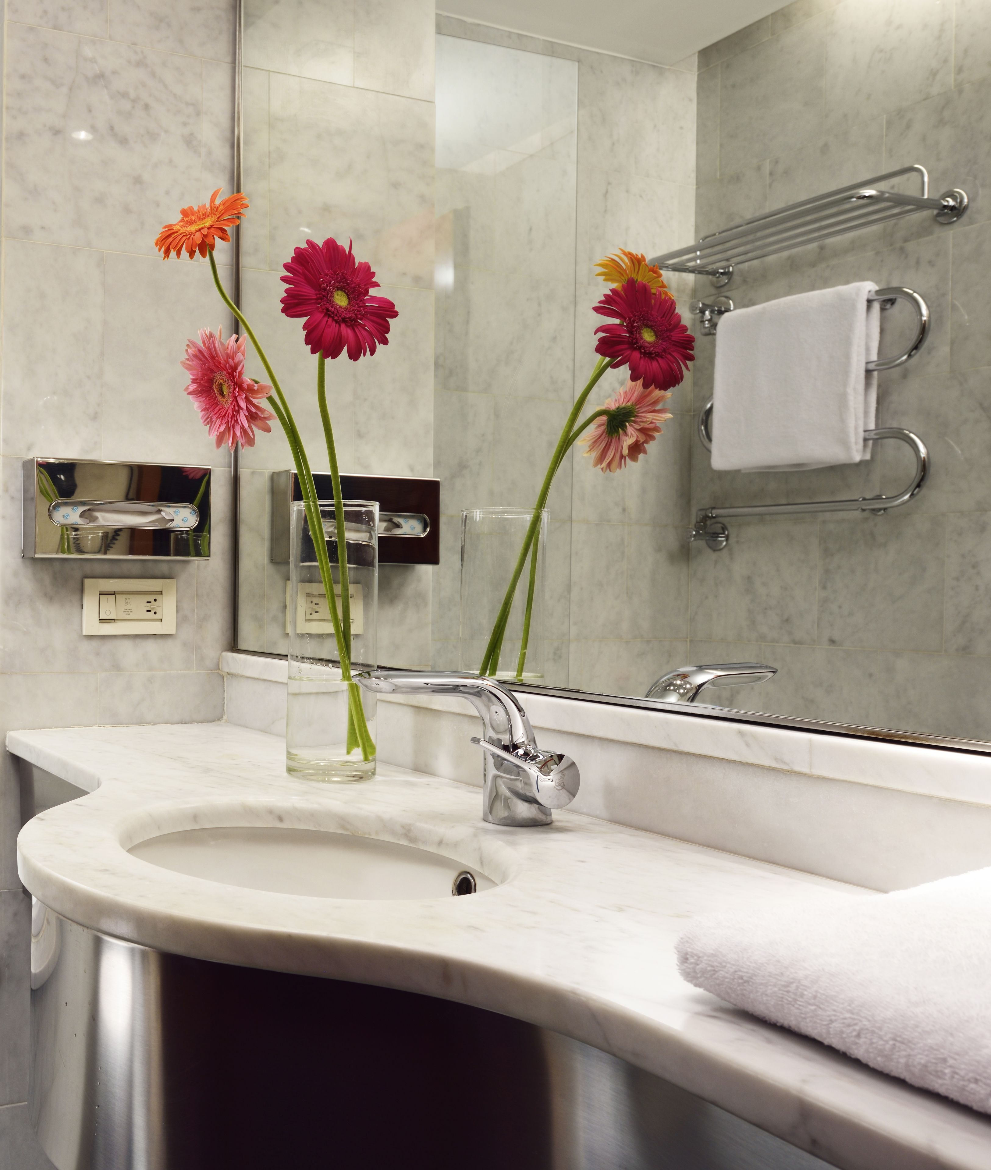 rainfall showerhead, hair dryer, bidet, towels