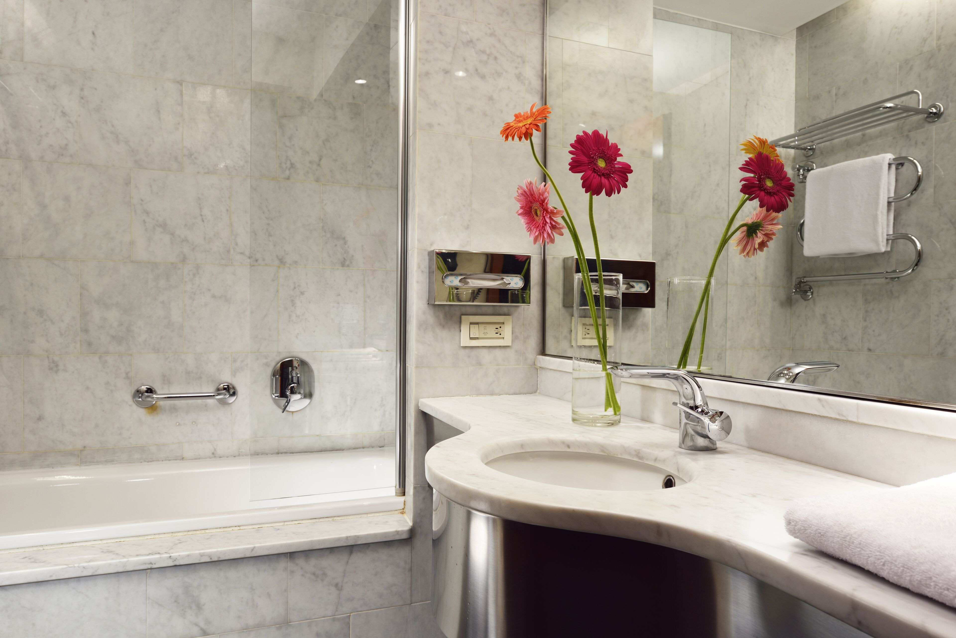 rainfall showerhead, hair dryer, bidet, towels