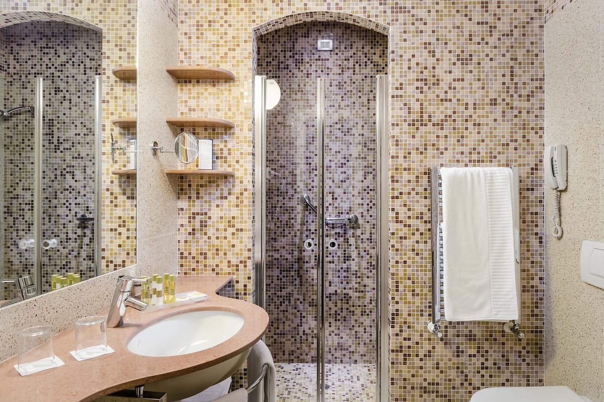 eco-friendly toiletries, hair dryer, bidet, towels