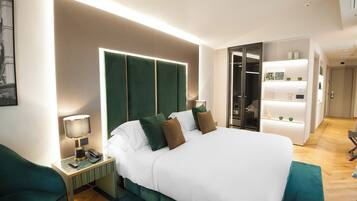 Suite exclusiva | 2 habitaciones, ropa de cama de alta calidad, edredón y minibar