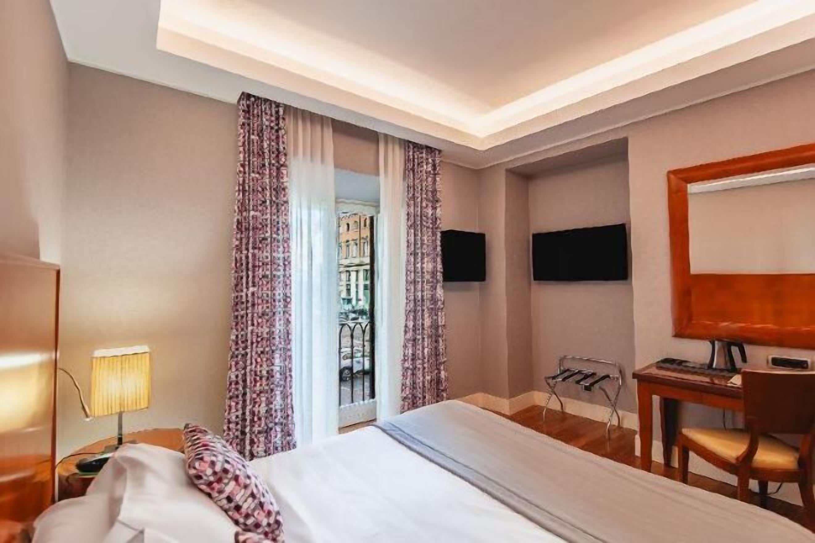 Premium bedding, down duvets, minibar, in-room safe