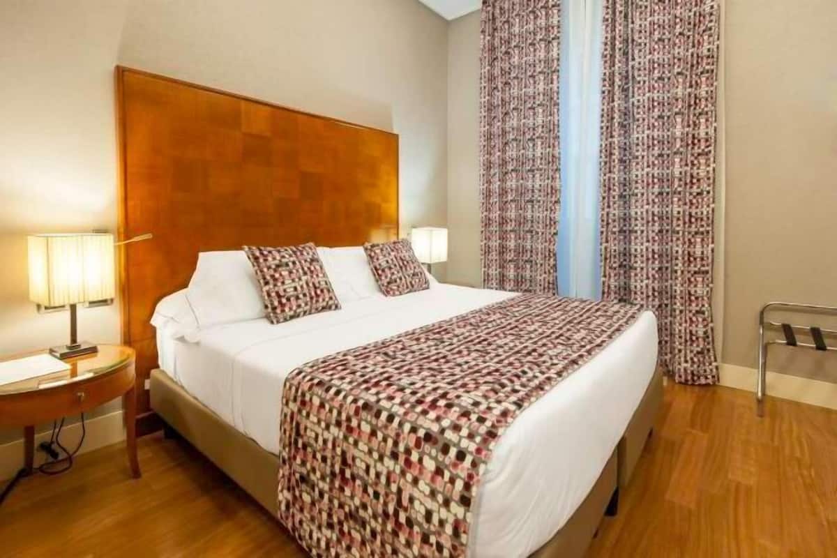 Premium bedding, down duvets, minibar, in-room safe
