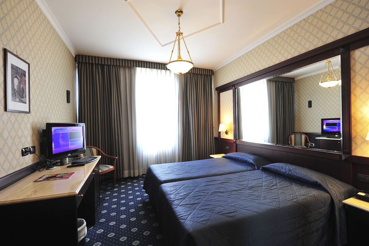 Ropa de cama de alta calidad y minibar